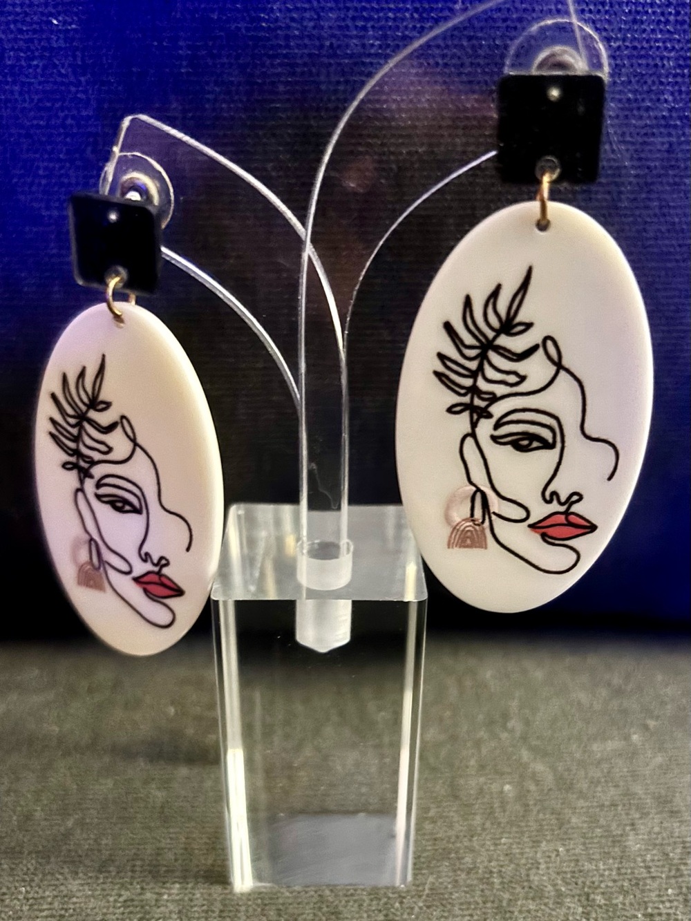 White Oval Artistic Face Dangle Earrings with Black Accent